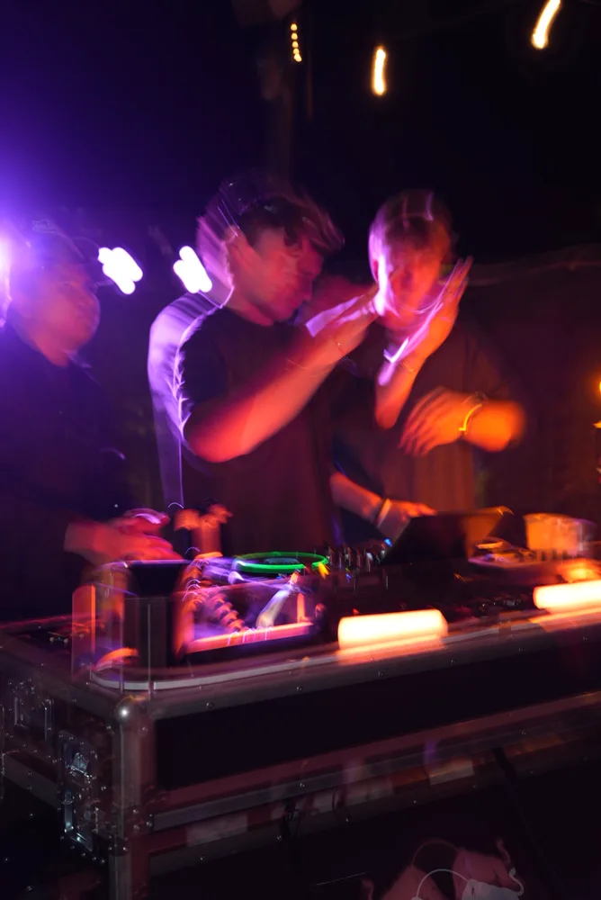 Lane Watt caught in a moment at the decks under purple lights