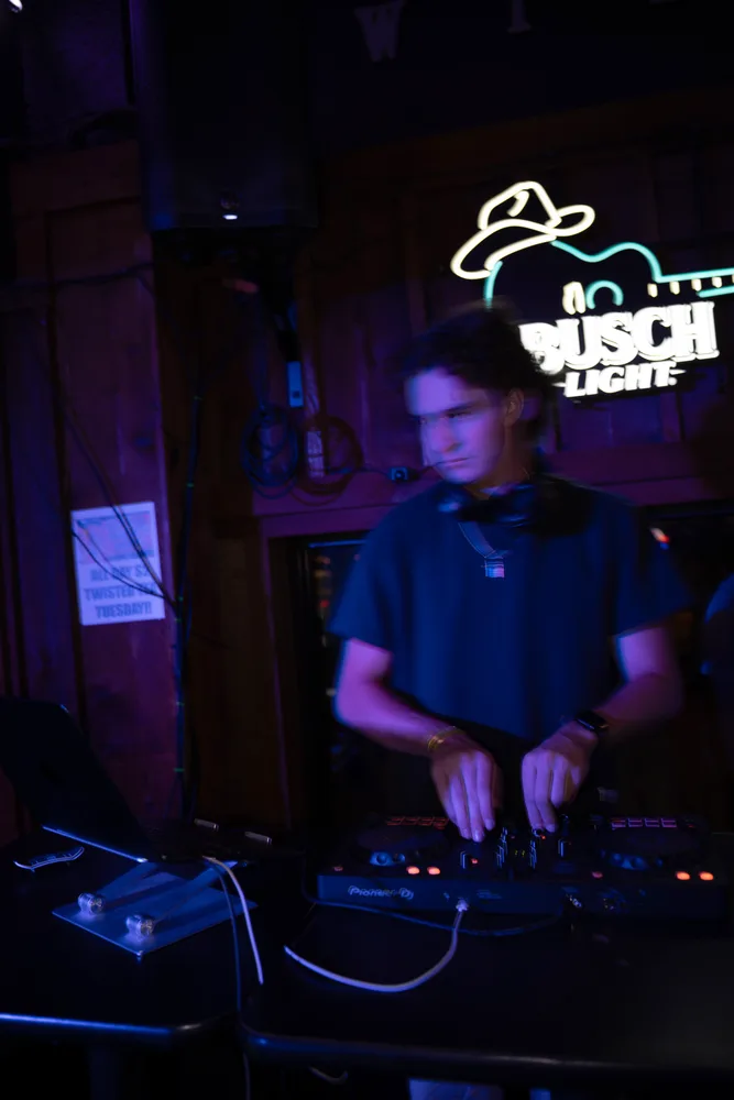 Lane Watt at the decks under blue venue lighting